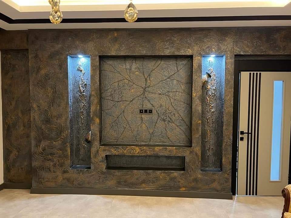 Backlit stone feature wall with display niches
