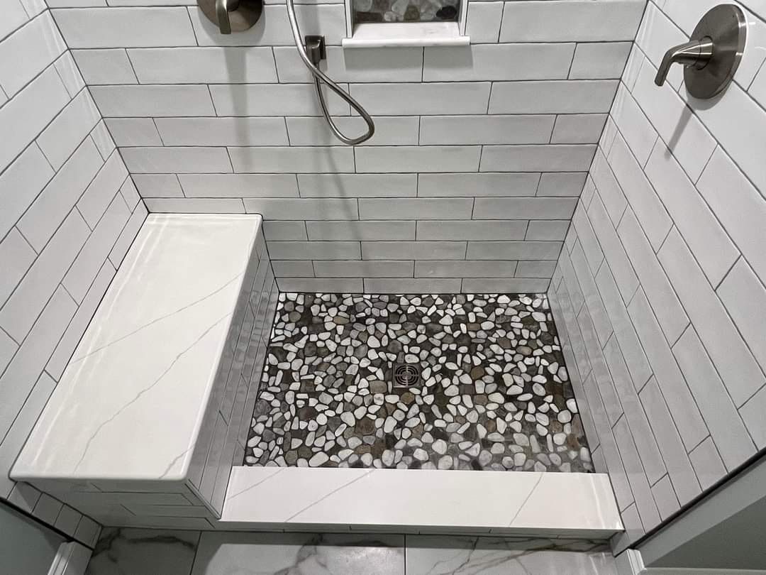 Walk-in shower with white subway tile in Calgary bathroom renovation