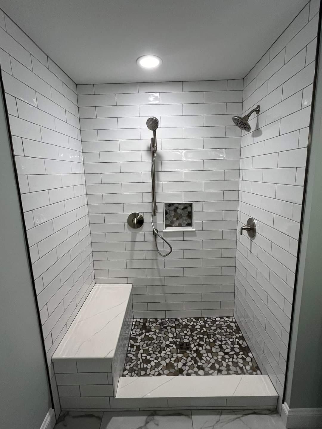 Modern walk-in shower with bench and rainfall shower head, Calgary