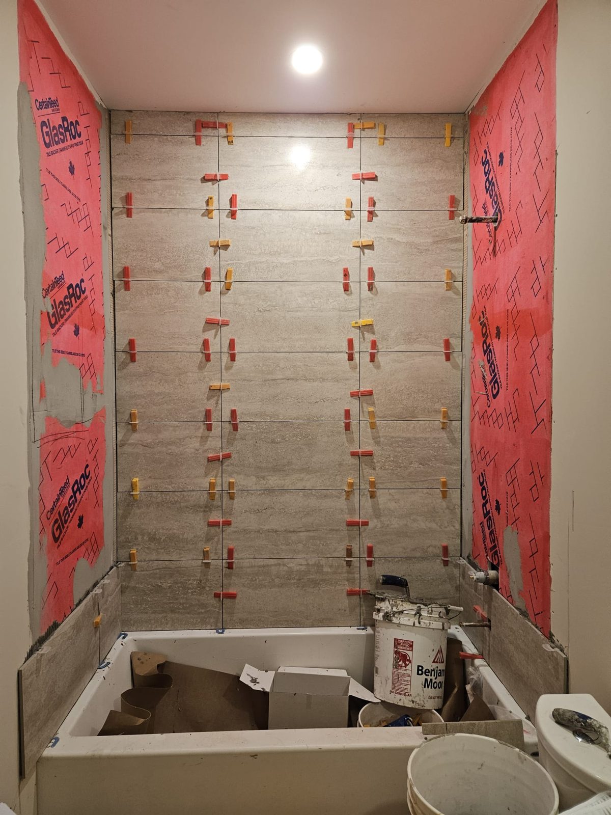 Waterproofing membrane applied in shower before tiling