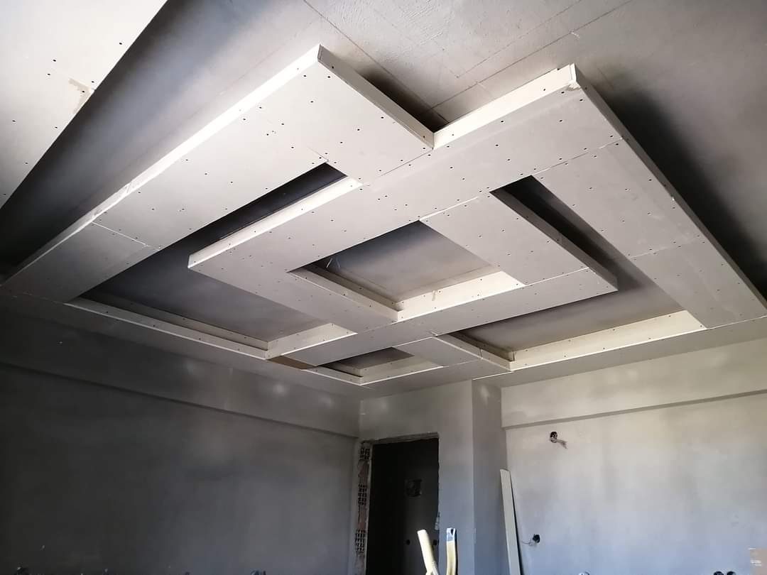 Finished geometric coffered ceiling in Calgary home