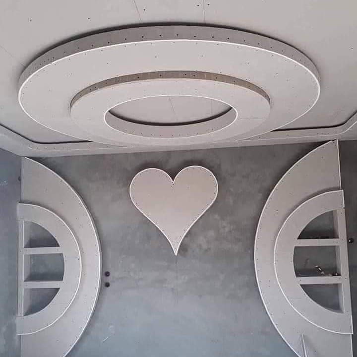 Ornate circular ceiling medallion with heart motif