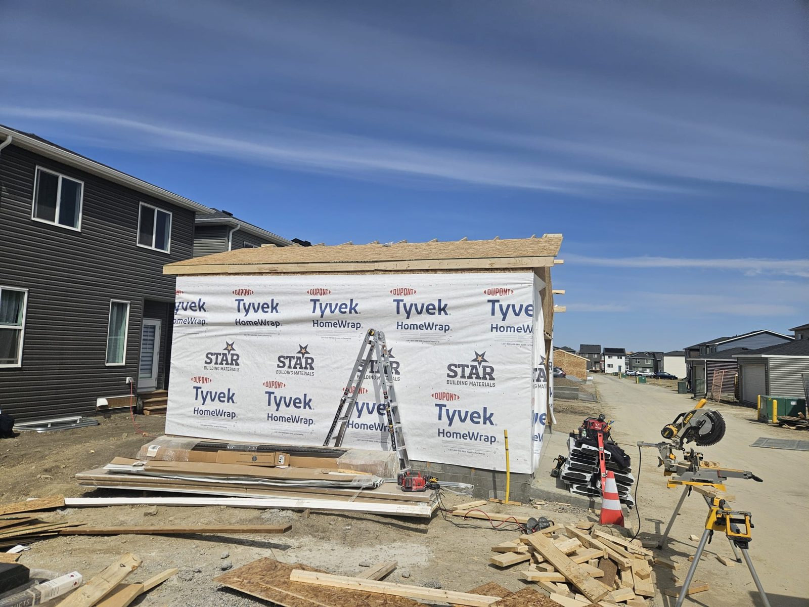 New structure wrapped in weather barrier, Calgary