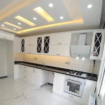Modern white kitchen renovated in Calgary